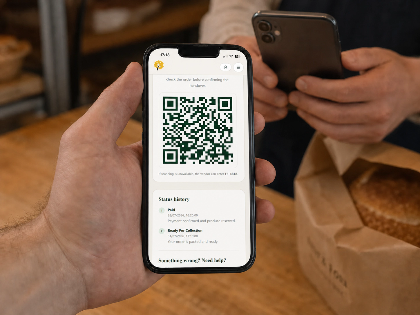 foodforfolk ready-for-collection QR displayed on a phone for a producer to scan